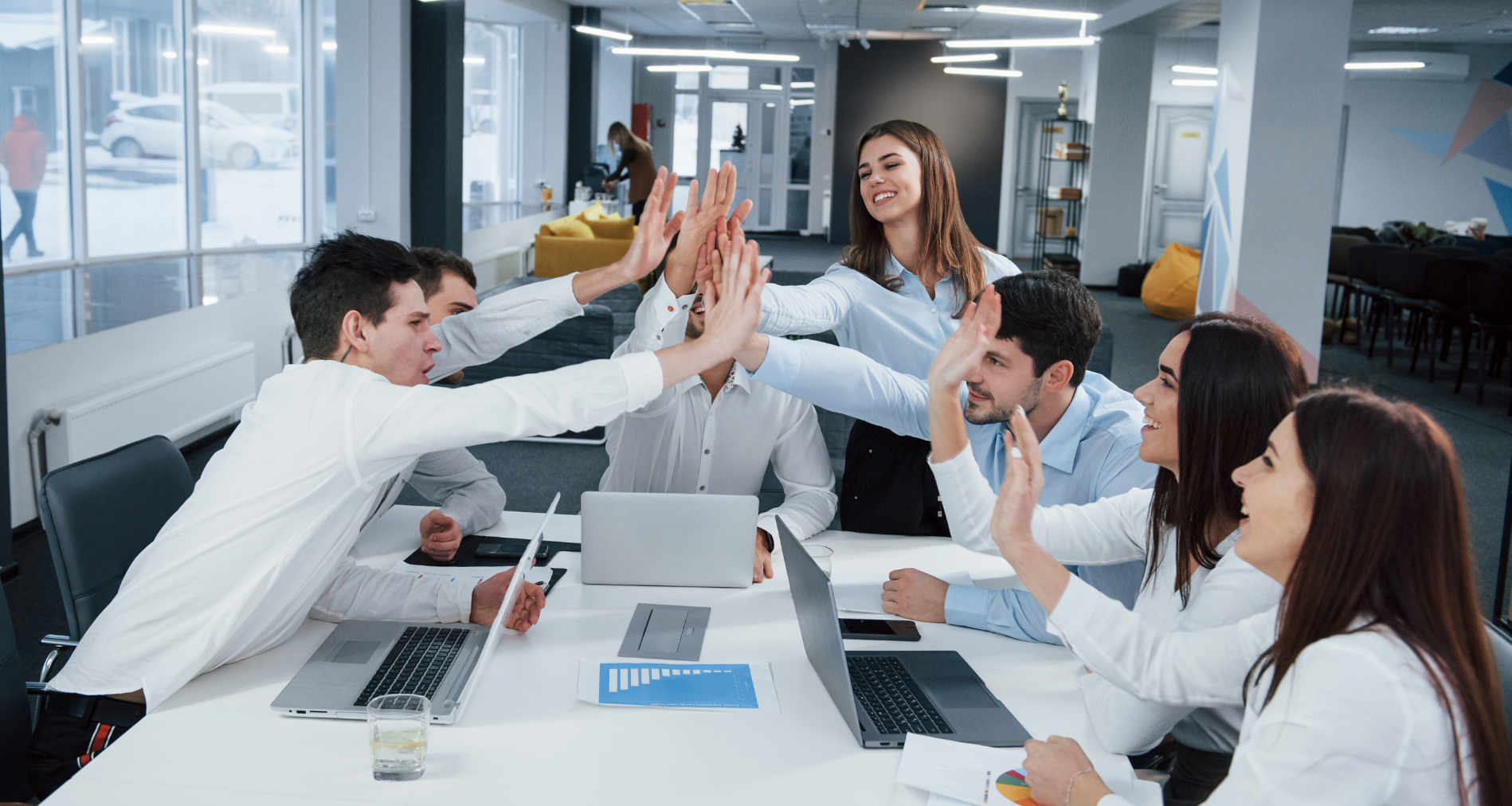 cheerful-business-people-job-is-done-group-of-office-workers-happy-to-hit-their-own-records-and-being-successful@2x